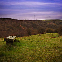 Buy canvas prints of The bench in the valley by Derrick Fox Lomax