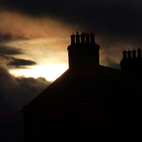 Buy canvas prints of  lovely roof top sunset in Arbroath by aidan dunbar