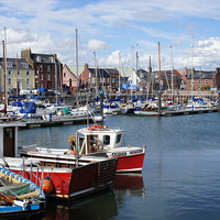 Buy canvas prints of  Arbroath harbour on a sunny day  by aidan dunbar
