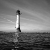 Buy canvas prints of  Bellrock lighthouse Arbroath low tide b&w by aidan dunbar