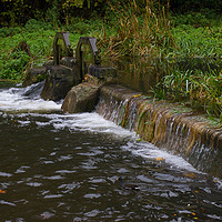 Buy canvas prints of Overflowing weir by paul green