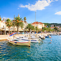 Buy canvas prints of Supetar harbour  on the island of Brac in Croatia in afternoon s by Chris Warham