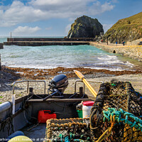 Buy canvas prints of Mullion Cove and harbour after a storm by Chris Warham