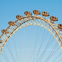 Buy canvas prints of London Eye against a winter blue sky by Chris Warham