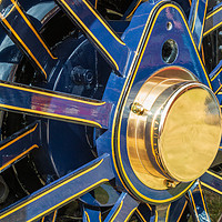 Buy canvas prints of Blue and brass steam traction engine wheel by Chris Warham