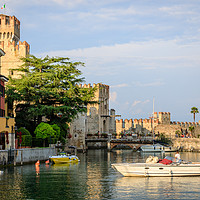 Buy canvas prints of Sirmione on Lake Garda - castle and harbour by Chris Warham