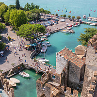 Buy canvas prints of Sirmione harbour and Lake Garda by Chris Warham