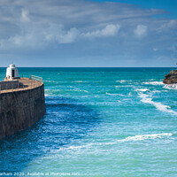 Buy canvas prints of Portreath harbour and the historic 'Monkey Hut' by Chris Warham
