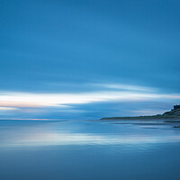 Buy canvas prints of Bamburgh Castle In The Blue Hour by Phil Durkin DPAGB BPE4