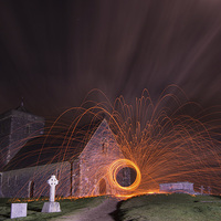Buy canvas prints of  Sparks Fly at St. Martha's Church, Guildford by Sarah Scott