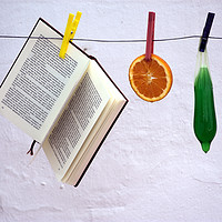 Buy canvas prints of This is a still lfe made with an orange, a book an by Jose Manuel Espigares Garc