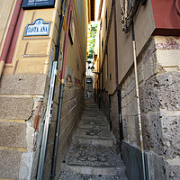Buy canvas prints of This is a very narrow street in Granada. This sort by Jose Manuel Espigares Garc