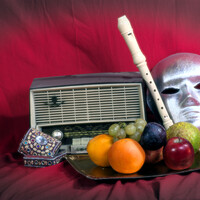 Buy canvas prints of Still life with an old radio, mask and some fruit by Jose Manuel Espigares Garc