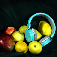 Buy canvas prints of Still life with fruit and blue headphones by Jose Manuel Espigares Garc