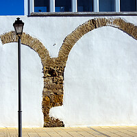 Buy canvas prints of Imperfect symmetry - two brick arches by Jose Manuel Espigares Garc