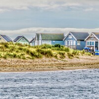 Buy canvas prints of Beach huts on Mudeford Spit by Beryl Curran