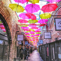 Buy canvas prints of Colourful Umbrella Paradise Camden Market by Beryl Curran