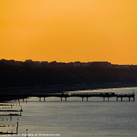 Buy canvas prints of Sunrise at Boscombe Pier by Beryl Curran