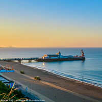Buy canvas prints of A Glowing Sunrise over Bournemouth Beach by Beryl Curran