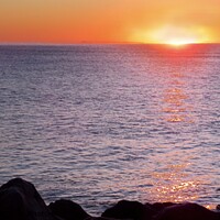 Buy canvas prints of Sunrise at Lyme Regis Panoramic  by Beryl Curran