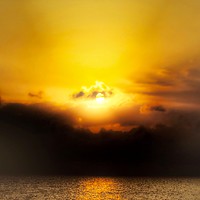 Buy canvas prints of Golden Sunrise Through Moody Clouds by Beryl Curran