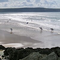 Buy canvas prints of Riding the Waves at Woolacombe Beach by Beryl Curran