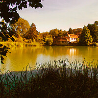 Buy canvas prints of The Country House across the lake. Sussex by Beryl Curran