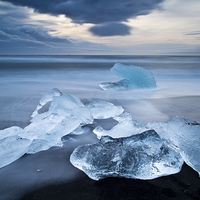 Buy canvas prints of  Ice alive at Jokulsarlon beach by DEREK ROBERTS