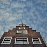 Buy canvas prints of Classic Amsterdam Residential Building by Adam Szuly