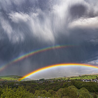 Buy canvas prints of Dramatic skies over Derbyshire with double rainbow by John Finney