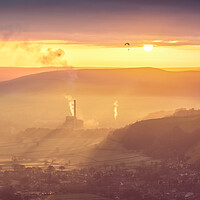 Buy canvas prints of A powered paraglider over the village of Castleton by John Finney