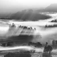 Buy canvas prints of Little Langdale tarn and mist, Cumbria.  by John Finney