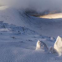 Buy canvas prints of Helvellyn range in winter, Lake District.  by John Finney
