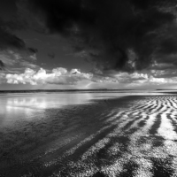 Buy canvas prints of Bamburgh beach, Northumberland.  by John Finney