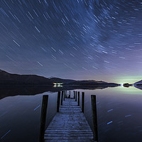 Buy canvas prints of Derwent Water Aurora Star Trails, Lake District. by John Finney