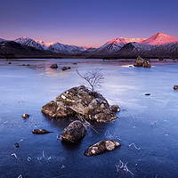 Buy canvas prints of Lochna na Stainge frozen Loch by John Finney