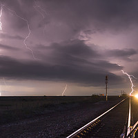 Buy canvas prints of Railroad lightning  by John Finney