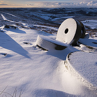 Buy canvas prints of Millstones in the Snow, Derbyshire.  by John Finney