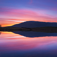 Buy canvas prints of Tewet Tarn sunrise. Lake District by John Finney