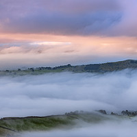 Buy canvas prints of Eccles Pike rises above the fog at sunrise  by John Finney