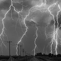 Buy canvas prints of Lightning storm over Nebraska. black and white by John Finney