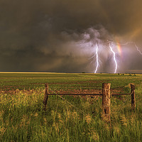 Buy canvas prints of Double rainbow and lightning by John Finney