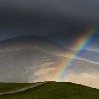 Buy canvas prints of Blencathra rainbow, Lake District. by John Finney