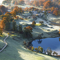Buy canvas prints of Lake District Autumn morning on Loughrigg Tarn by John Finney