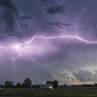 Buy canvas prints of Forked Lightning Over a Montana Post Office, USA.  by John Finney