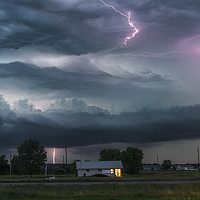 Buy canvas prints of Forked Lightning Over a Montana Post Office, USA.  by John Finney