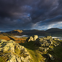 Buy canvas prints of Dramatic light on Loughrigg Fell  by John Finney
