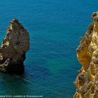Buy canvas prints of Cliffs and Ocean in Carvoeiro by Angelo DeVal