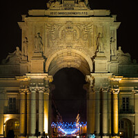 Buy canvas prints of The Rua Augusta Arch at Night in Lisbon by Angelo DeVal
