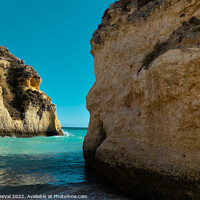 Buy canvas prints of Tres Irmaos Beach Cliffs and Sea in Alvor by Angelo DeVal
